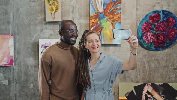 Couple Taking Selfie on Exhibition