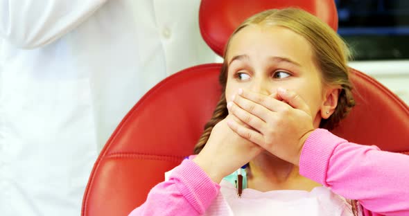 Young patient scared during a dental check-up