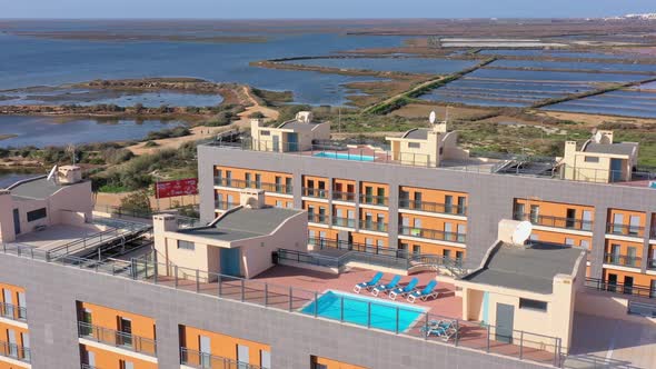 Aerial View of the Urban Area of Portugal in the South of Houses with Modern Infrastructure Swimming