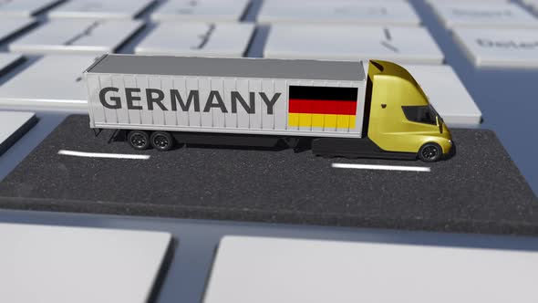 Flag of Germany on Moving Truck and Computer Keyboard