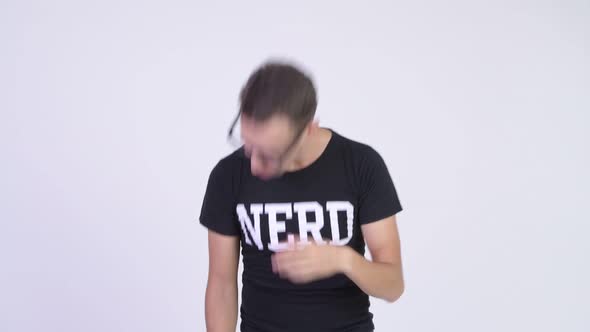 Studio Shot of Sick Nerd Man Sneezing