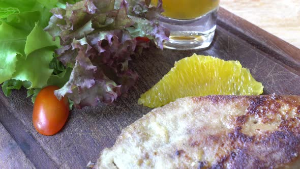 Grilled foie grass steak in white plate