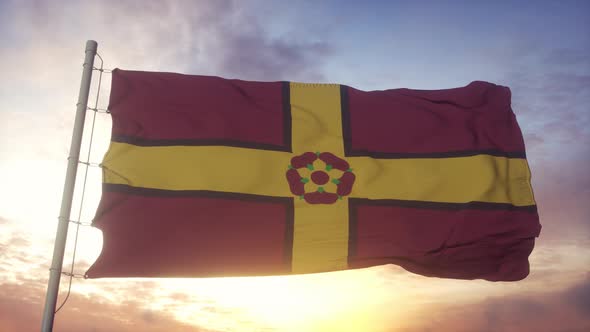 Northamptonshire Flag England Waving in the Wind Sky and Sun Background