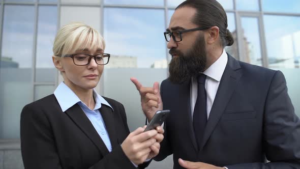 Strict Boss Criticizing Upset Female Secretary for Mistakes, Stressful Job