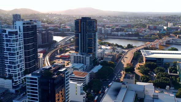 South Brisbane Riverfront High-rise Buildings At Sunset In Brisbane, QLD, Australia. - aerial