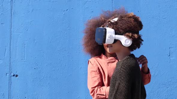 Teen African American friends with VR headset