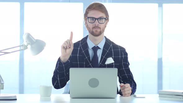 Redhead Businessman Denying Offer by Waving Finger, Rejecting