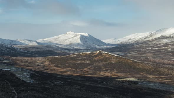 Timelapse of Misty Clouds Moving and Shading The Mountains of Dovrefjell and Snohetta in Hjerkinn, N