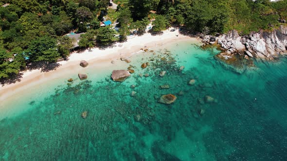 Aerial View Top View Drone Move Beautiful Tropical Beach with White Sand and Rocks