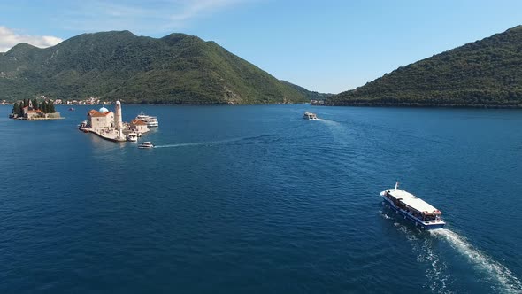 Pleasure Boat Sails Along the Bay of Kotor to the Island of Gospa Od Skrpjela