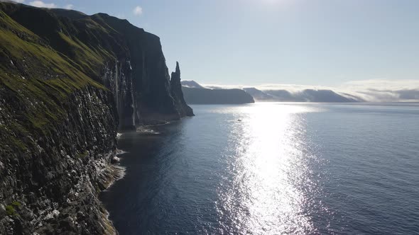 Drone Along Coastline Of Vagar With Trollkonufingur