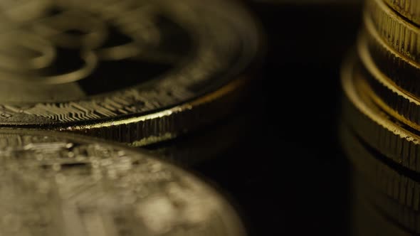 Rotating shot of Bitcoins (digital cryptocurrency) - BITCOIN 0640