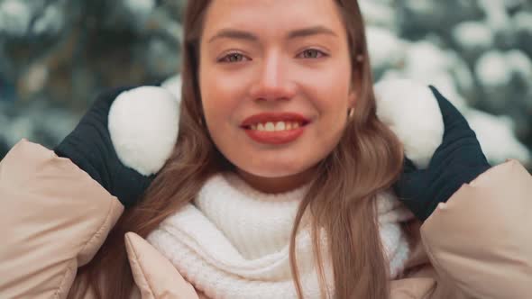 Close Up Portrait Young Woman with Fur Earmuffs Winter Day Outdoor