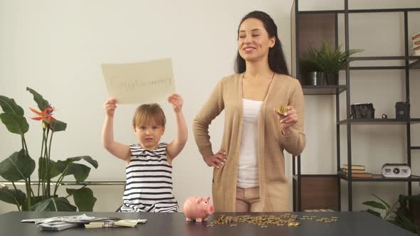 Girl Raises Up Cryptocurrency Sign Mother Holds Gold Bitcoin