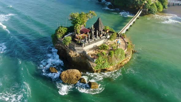 Aerial orbiting view of Balekambang Hindu Temple, Java, Indonesia on sunny day