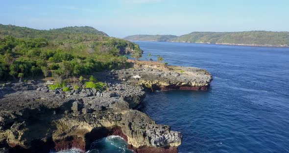 Aerial drone view of a rocky beach coastline