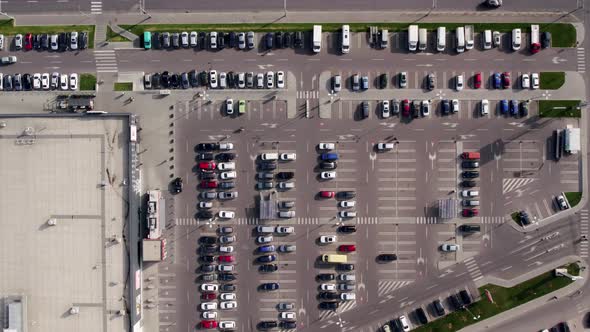 Aerial Drone View Top Down View of Supermarket Parking Lot with a Lots of Cars