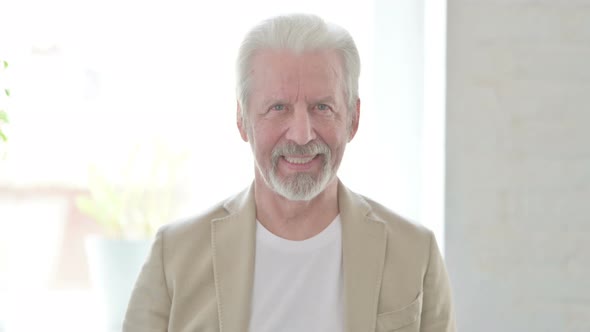 Portrait of Old Man Smiling at Camera