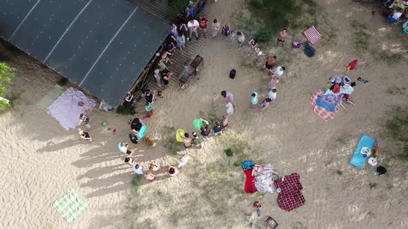 Drone Video of People Resting on Beach