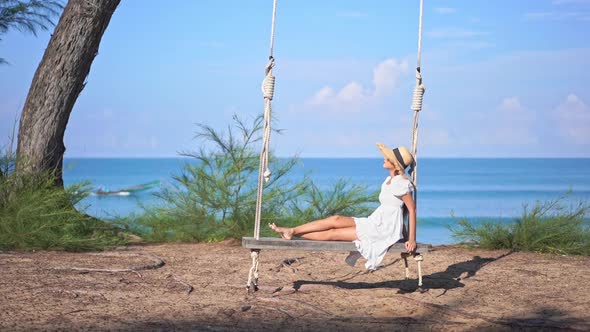 Asian woman enjoy around beautiful beach sea ocean