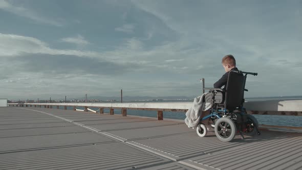 Lonely Ride in Wheelchair