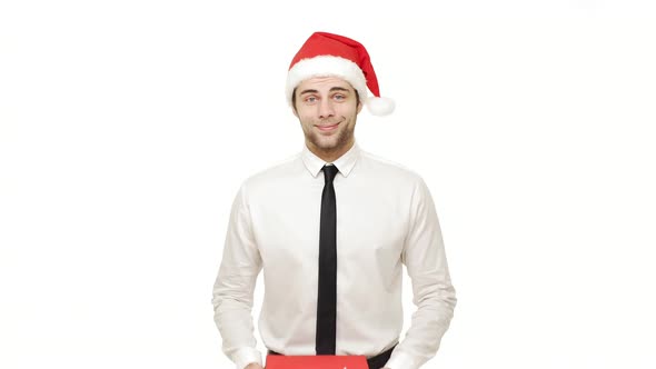  Businessman Giving Present To Camera Over Isolated White Background.