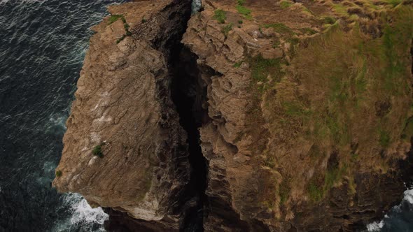 Huge Rock Cracked in the Ocean