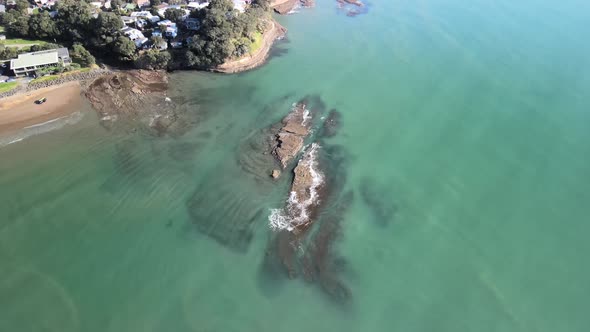 Rocky shorelines of Red Beach, New Zealand