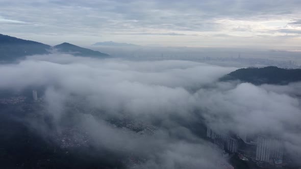 Aerial view Paya Terubong town in morning cloud