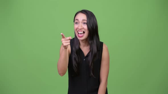 Young Beautiful Asian Businesswoman Laughing