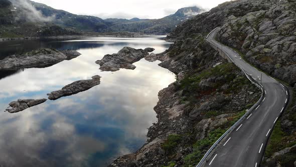 Road And Lakes In Mountains Norway. Aerial View.