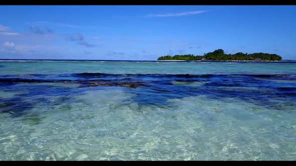 Aerial flying over abstract of tropical coast beach trip by blue ocean and white sandy background of