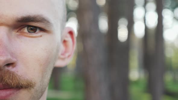 Close up of male face on the street.