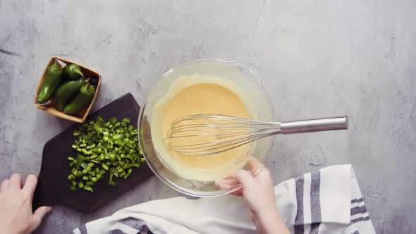 Time lapse. Step by step. Flat lay. Slicing jalapeno peppers for spicy jalapeno cornbread.