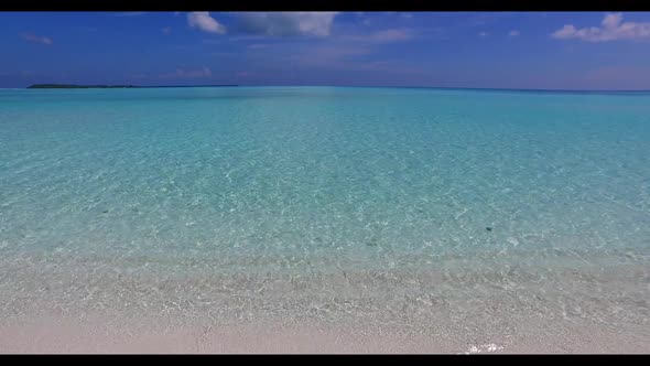 Aerial top view landscape of tranquil resort beach holiday by turquoise water with white sandy backg