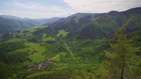 Breathtaking View Of  Lush Forest Mountains, Fields, And Houses In Slovakia Carpathians - Liptov. Ae