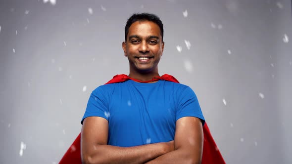 Happy Smiling Indian Man in Red Superhero Cape