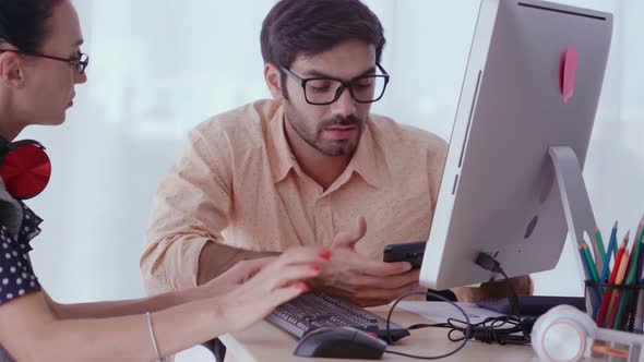 Creative Business People Group Having Conversation at Office Desk in Workplace