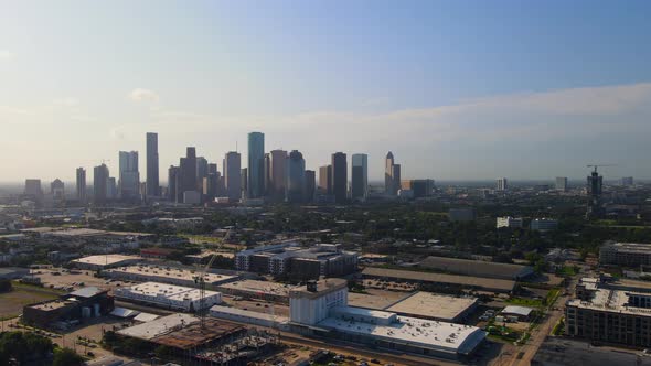 Rotating around industrial park with Houston skyline