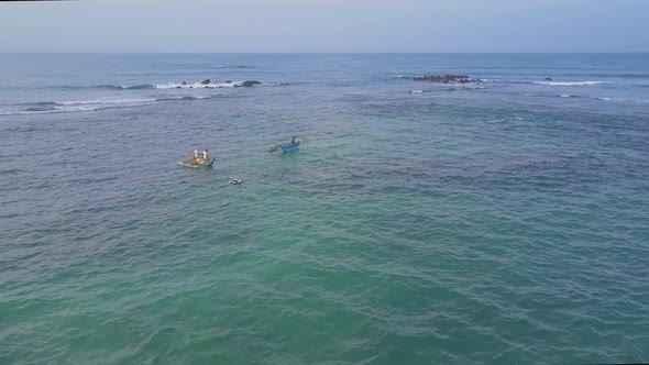 Ocean with Pier and Sailing Boats Aerial View