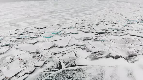 Aerial View Ice Hummock and Cracks at Frozen Lake