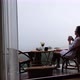 A woman drinking drip coffee and enjoy watching a beautiful nature view on foggy day - VideoHive Item for Sale