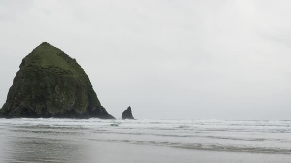 Panning view of Haystack Rock