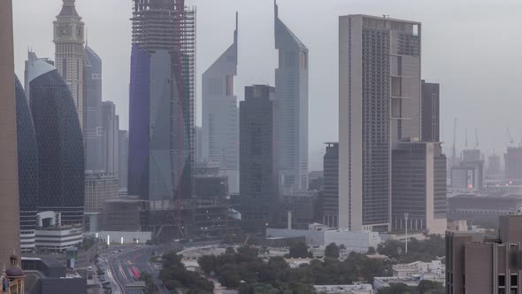 Dubai Downtown Skyline at Morning Aerial Timelapse with Traffic on Highway