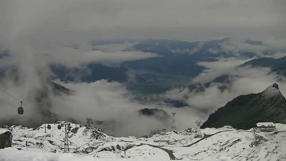 View from the Kitzeinhorn with rising clouds.