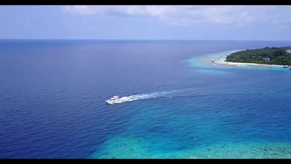 Aerial landscape of perfect shore beach journey by aqua blue ocean and white sandy background of a d