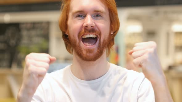 Happy Redhead Beard Man Celebrating Success