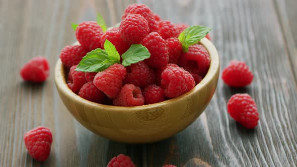 Fresh Raspberry on Wooden Table 