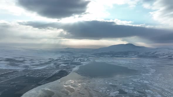 Aerial view of frozen Lake Paravani. The largest lake in Georgia