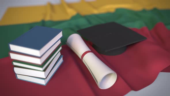 Graduation Cap and Diploma on the Flag of Lithuania
